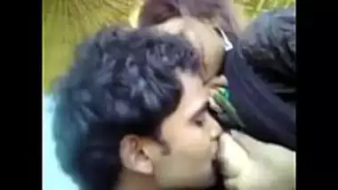 Outdoors boobs sucking session of a Muslim girl