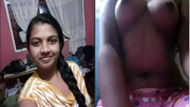 Desi woman slowly lifts striped top and has fun with juicy breasts