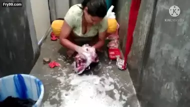Horny booby aunty washing clothes showing huge hanging boobs