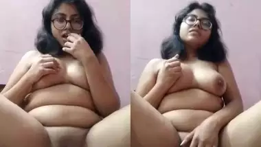 Chubby Desi girl fingering her shaved pussy